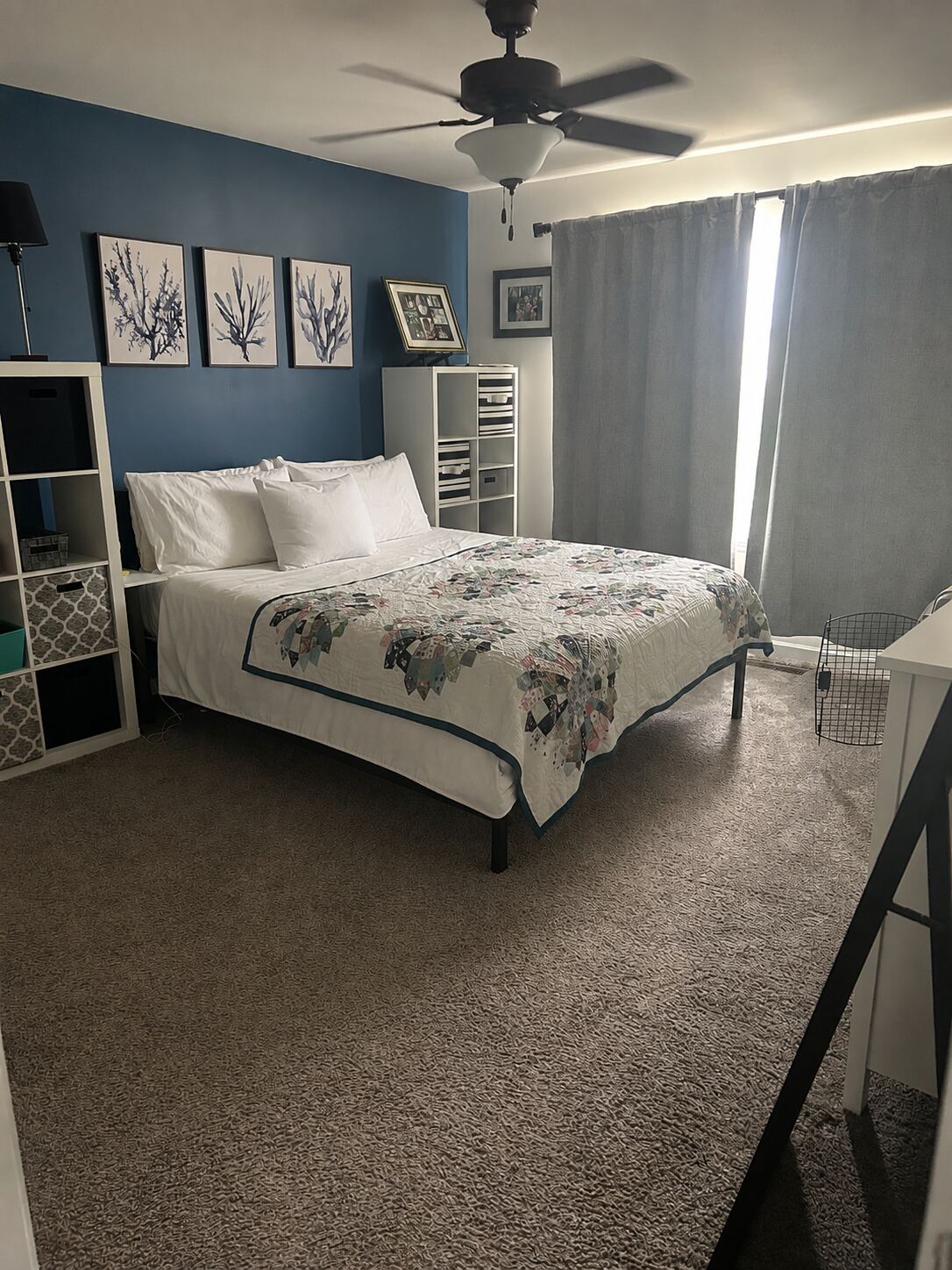 Clean bedroom with made bed after a house cleaning